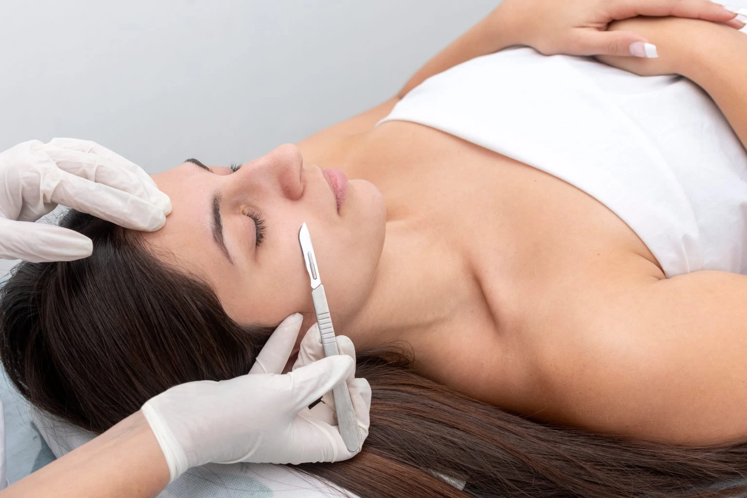 A Woman Getting Dermaplaning Treatment in Mesa, AZ | Emily Frost Aesthetics