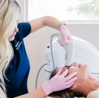 Emily Frost NP Giving Laser Treatment in Mesa, AZ